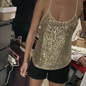 Cleaning Out My Closet!
(5’7 130 LBS) 
Lightly Worn
Size Small
Gold Top
